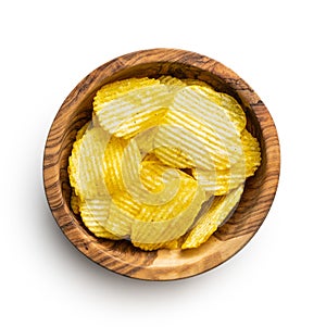 Crispy potato chips in bowl