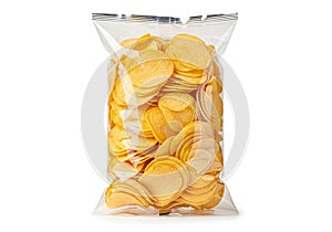 Crispy potato chips in transparent packaging