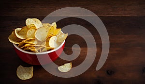 Crispy Potato Chips in Wooden Bowl on Rustic Table, Copy Space