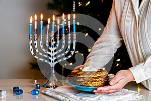 The crispy potato latkes served during Hanukkah are traditional Jewish food dish.