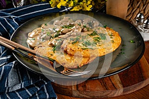 Crispy potato pancakes with mushroom sauce