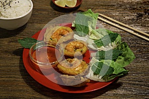 Crispy rice pancakes with prawns, Vietnamese mint leaves or banh khot, khot cake