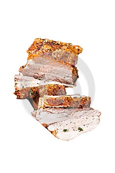 Crispy Roast Pork Belly. Sliced roasted meat with crust in a tray with spices. Isolated, white background.