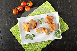 Crispy rolls of ham with cheese