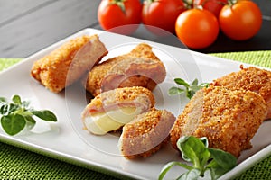 Crispy rolls of ham with cheese