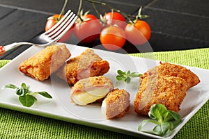 Crispy rolls of ham with cheese