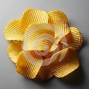 Crispy ruffled potato chips arranged in a pile