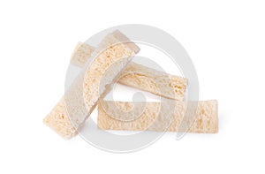 Crispy rusks on white background, top view