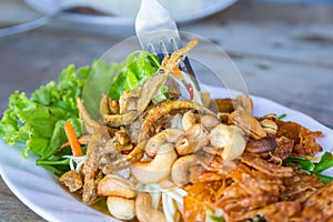 Crispy small fish and cashews in spicy salad