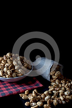Crispy Sugared peanuts in Sack and white cup