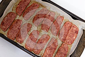 Crispy turkey bacon baked in a baking sheet.