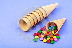 Crispy waffle cones with colorful candies