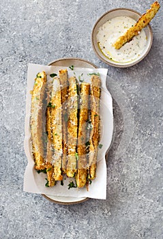 Crispy zucchini baked with parmesan cheese and bread crumble