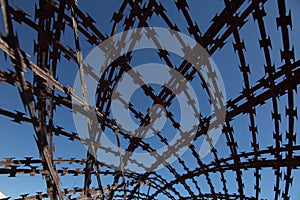 Criss crossed barbed wire