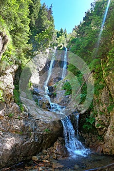 Waterfall in bucegi mountains devil`s mill photo