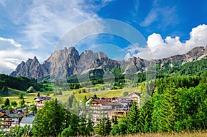 Cristalo ridge and green meadows in Dolomites
