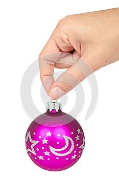 Cristmas decoration, glass blue ball in hand isolated on white background. New Year object