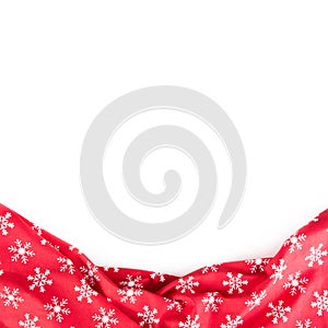 Cristmas red tablecloth with snowflakes isolated on white background - Top of view