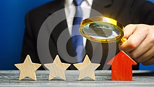 A critic rates a hotel rating. Three stars. The evaluation of visitors. Quality level, good service. Customer rating. Feedback