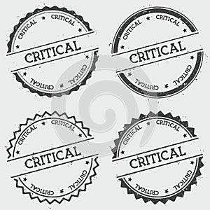 Critical insignia stamp isolated on white.