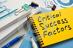 Critical success factors. Handwritten note on an office notepad.