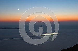 Criuse liner at the sunset and moonrise