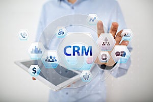 CRM. Customer relationship management concept on virtual screen.