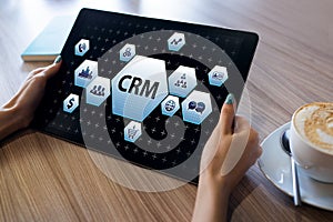 CRM - customer relationship management system concept on screen.