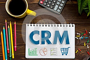 CRM. Customer Relationship Management. Tablet on the office Desk
