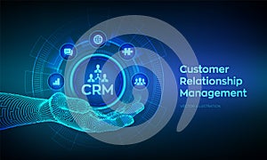 CRM icon in robotic hand. Customer Relationship Management. Customer service and relationship. Enterprise Communication and