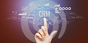 CRM theme with hand pressing a button