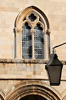 Croatia, Dubrovnik. Intricate window in a Baroque facade.