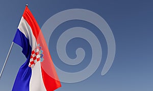 Croatia flag on flagpole on blue background. Place for text. The flag is unfurling in wind. Croatian, Zagreb. Balkans. 3D