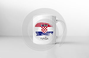 Croatia flag on white coffee mug.