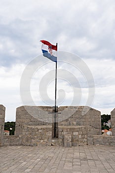 Croatia national flag evolves over the fortress
