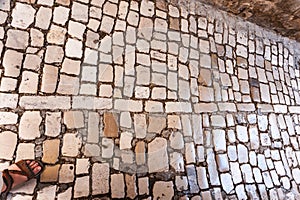 Croatia.The texture of the old cobblestone pavement.