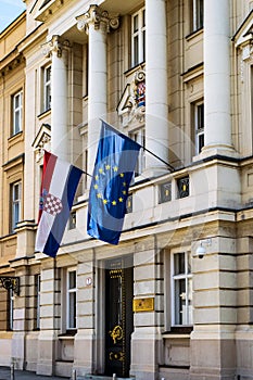 Croatian parliament with flags of european union and croatia