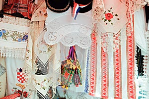 Croatian souvenir traditional tablecloths and towels sold at local market