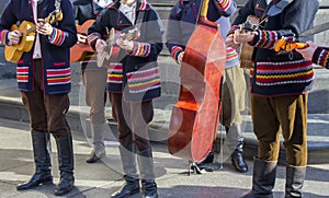 Croatian tamburitza musicians in traditional folk costumes