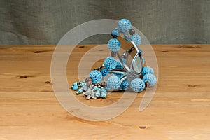 Crochet handmade blue beads and a hand mirror