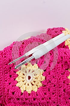 Crochet handmade granny square pattern, crocheting supplies.