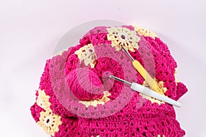 Crochet handmade granny square pattern, crocheting supplies.