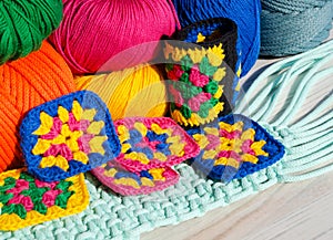 Crochet, handmade patterns and colorful threads. Colorful cotton granny square