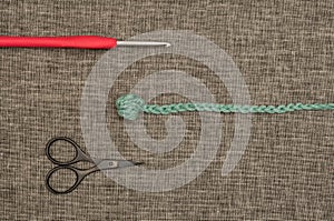 Crochet Hook, Knitted Yarn, and Thread Snips