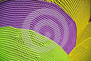Crochet pattern, a close up of a simple colorful knitting pattern for background