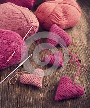 Crochet pink hearts and yarn photo