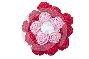 Crochet roses with yarn for giving to those we love, Valentine`s day isolated on white background.