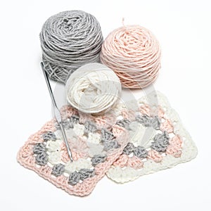 Crochet work and balls of yarn photo