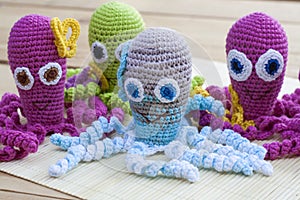 Crocheted woven with colored wool toy octopus