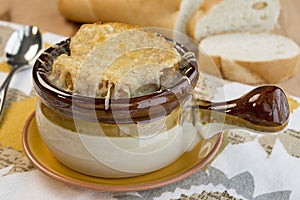 Crock of French onion soup photo